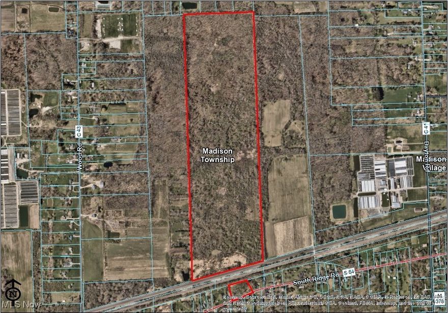 130 Acres of Prime Madison Land – Development, Agriculture, Hunting Land or Private Estate Potential. Discover a rare opportunity to own 130 acres of beautiful, versatile land in the heart of Madison, Ohio. Spanning two connected parcels, this exceptional property runs from Middle Ridge Road to State Route 84 (South Ridge Road) and offers valuable frontage on both roads—ideal for developers, investors, or those looking to build a private retreat. Zoned A-1, the land offers unlimited potential: residential development, agricultural use, large-scale vineyard, equestrian estate, solar or renewable energy projects—the possibilities are only limited by your vision. Included on the 9-acre parcel is a 1,620 sq ft all-electric manufactured home with 3 bedrooms and 1 bath, perfect to live in while the "Forever" home is being built, or tear it down to the foundation and with a 35’ x 67’ pole building (built in 2000)—perfect for equipment storage, workshop use, or farm operations. Mineral rights will convey to the new owner, adding long-term value to the purchase. Located just minutes from local shopping, freeway access, schools, hospitals, and several of Madison’s renowned wineries, this property blends rural tranquility with convenience. Whether you're looking to develop a new residential community or create your own off-the-grid homestead, this land delivers location, scale, and opportunity. Very few parcels this size exist! Don’t miss your chance to shape the future of this prime Madison acreage. Schedule your private tour today.
