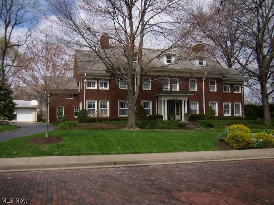 Situated on a double lot in the heart of historic Ridgewood, this stately home offers the character of an older home with all the modern conveniences of today. COMPLETELY updated with approximately 6,800 total sq ft, 5 bedrooms and 3 full & 3 half baths. Elegant formal living & dining rooms; bright sun room & cozy den. Remodeled gourmet kitchen with granite, stainless appliances & walk-in pantry. Fabulous master bedroom suite has multiple closets, recently remodeled bath & dressing room. Finished 3rd floor (originally a ballroom) offers 850 sq ft of bonus space. Large office with built-ins. Finished basement boasts huge rec room with surround sound & built-ins, & exercise room. 2 car attached (heated) & 2 car detached garages. Two-story screened porch overlooks park-like yard with multiple patios & gorgeous landscaping. Beautiful hardwood floors, tile, and architectural detailing.  Too many updates to mention – call for list. This is the perfect Ridgewood home!