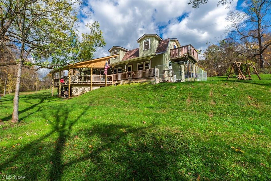 Escape to your own private retreat with this charming cabin nestled on 17 picturesque acres of wooded land. Surrounded by towering trees, abundant wildlife, this property offers peace, privacy, and a true connection to nature. The cozy cabin features 2 loft area bedrooms and 2 full bathrooms. The spacious open living area has knotty pine walls with warm wood finishes. Enter the covered porch providing a relaxing spot to enjoy your morning coffee or evening sunsets. The land is a mixture of trees and open clearing with a stream and paths all ideal for hiking, hunting, four wheeling or simply enjoying the outdoors. Whether your looking for a weekend getaway, or a short term rental investment this unique property delivers a rare combination of comfort and country charm. Additional features include an outbuilding and a small 12x12 cabin, and road frontage. The perfect place for making memories.