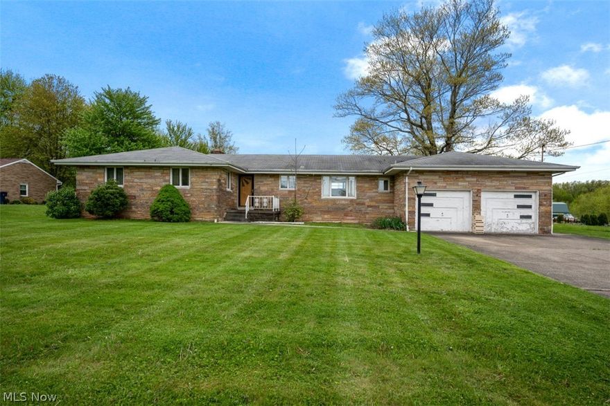 Great investment opportunity! Let you imagination run wild in this sprawling 2334 sf brick ranch located in Poland's school district. Be wowed by the beautiful marble foyer featuring crown molding and gorgeous ceiling medallions. You'll be cozy all winter long in the spacious living room with large crown molding and marble wood burning fireplace. The master bedroom features his and her closets with an attached master bath with shower! Plenty of room for guests or kids in the two additional bedrooms with ample closet space! Enjoy the company of friends and family in the eat in kitchen that's full of possibilities for your personal touches or take your entertaining into the formal dining room featuring crown molding and chandelier ceiling medallion. Spacious family room, previously used as a home office, opens via sliding glass door to the private concrete patio over looking the back end of this fantastic 1.03 acre property. Convenient first floor laundry room and half bath open to the a