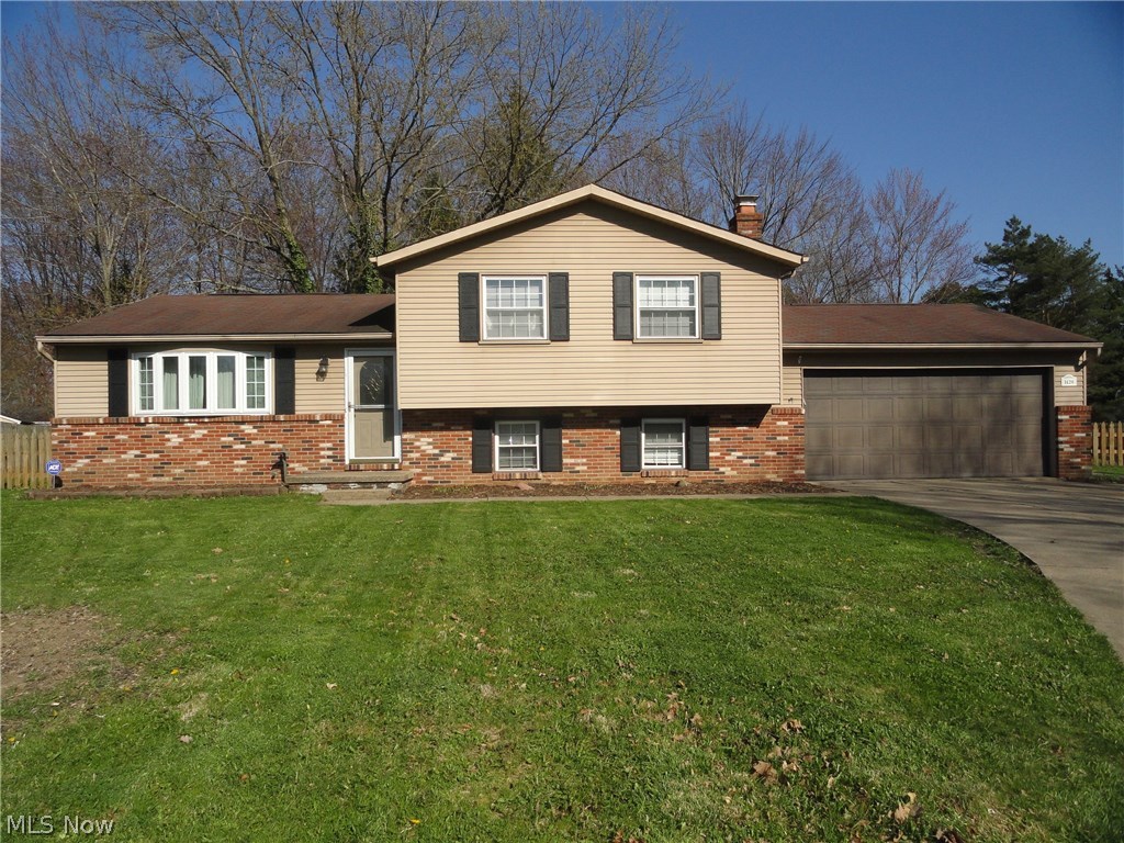 Here is an attractive 4 level split with great curb appeal and situated on a large fenced lot on the cul de sac in a quiet Stow neighborhood which is convenient to shopping and Route 8. Foyer entry with beautiful hardwood floors that continue into the cheerful kitchen with lovely oak cabinets. Formal living and dining room, sliders to the spacious sun room with cathedral ceiling overlooking the deck porch and private yard. The lower level includes the family room with a full wall brick fireplace and oak mantle,large laundry room and 2nd full bath. The basement has an extra finished room plus plenty of room for storage. Updates include the furnace in 2016 and the water heater in 2015. The furnace and ac were replaced within the past 10 years. Warranty included .Won't last long, call today to see!
.
.