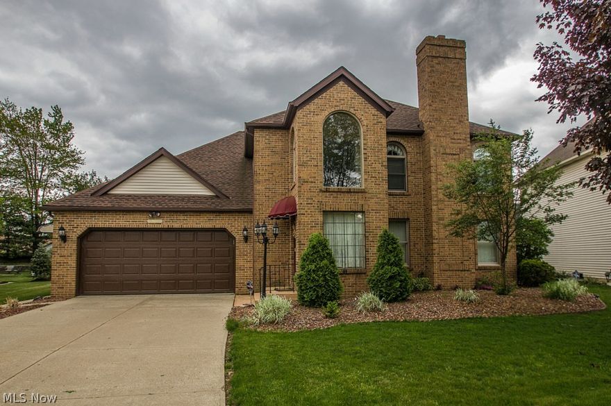 Wonderful Brick Front With A Woodburning Fireplace. some updates include: Over 3100 Sq Ft! Inlaw Suite On First Floor Family Room. A Bright & Neutral Home. VERY Large Bedrooms, many built ins New kitchen sink, All new handles on all cabinets, New front door, Medicine cabinets in 3 bathrooms, New back door and storm door, New solar tube in upstairs hall bathroom, 2 new Attic fans, New hot water tank 2013, Solar lighting in front of house, New roof 2012, New skylight in suite bathroom 2012, New bathroom faucets, New ceiling lights downstairs, New carpeting in suite and “dining room”, Mew kitchen floor in kitchen and hall guest bath, New fireplace screen and anvils, Large bay window sealed, New garage lights and lampposts, New landscaping: Arborvitae in front and back (Cahoun Nursery), Weigalia bushes in back, Decorative grasses in front and back, Bluegrass on lower retaining wall bed, All Western Sunrise rock around entire house. Solid wood wall of cabinets in upper bedroom. A true GEM!!