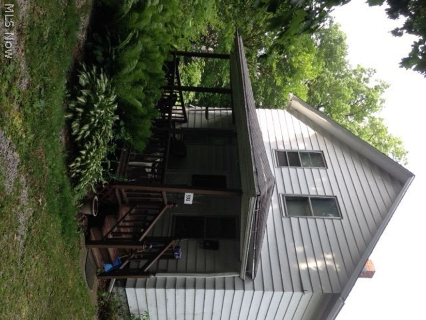 Green space in Akron!   Very large, serene and quite lot at the end of a dead in street.  Perfect for a gardener or great space for children and pets.  Lots of room to add a large garage and a pool!  Nice home ready for someone to give it care and updates or great investment property.  Easy access to rt 8.  All appliance (with the exception of fridges) included.  NEW ROOF!  HOME WARRANTY INCLUDED!!  Call today before it's gone!