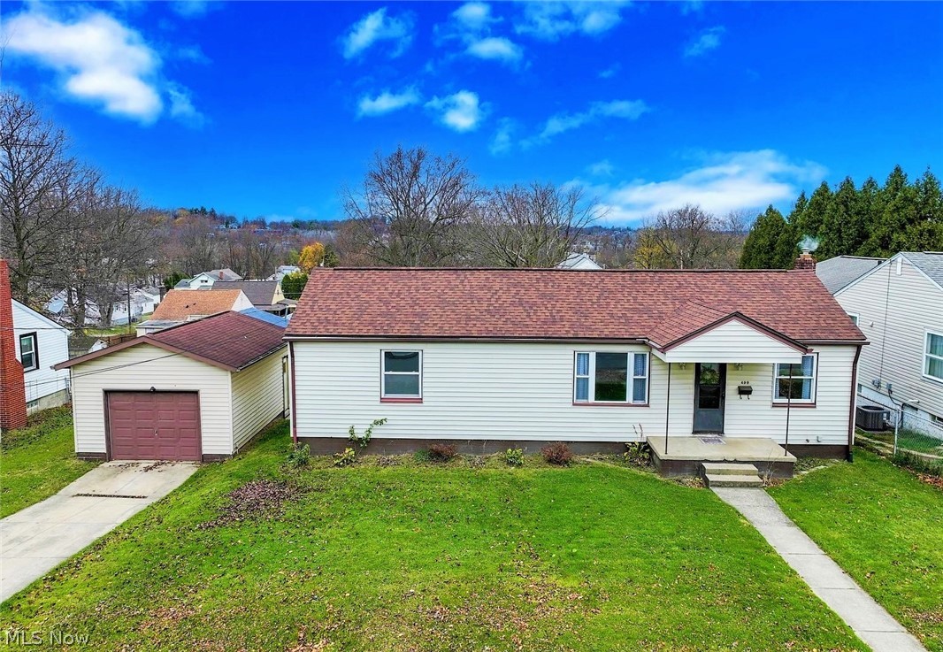 *One Floor Living RANCH In Barberton W/3 Bedrooms, 1 Bathroom, FULL Basement & Detached Garage On A .25 Acre Double Lot! *Enjoy Having Friends & Family Over Outdoors In The Beautiful LARGE 3/4 FENCED IN Back Yard! *NEW ROOF <6 Yrs! *Brand NEW CARPET In The Living Room and ALL Bedrooms! *NEW LUXURY Modern Rustic Grey/Brown PLANK Flooring ~ Eat In Kitchen! *Entire Home Has Been FRESHLY PAINTED! *NEW Ao Smith Signature Select Series Oversized H20 Tank 2020, Newer Glass Block Windows *White Trim Throughout *Walk In To A Cozy Living Rm W/Picture Window & Dark Accent Ceiling Fan *The Eat In Kitchen Showcases Lux Floor, New Ceiling Lights, Fresh WHITE CABINETS W/Stainless Hardware, White Tile Backsplash, Light Grey/Blue Countertop & Backsplash, Applianced With A Refrigerator & Stove *To The West Of The Home Are 2 Bedrooms W/New Carpet & A Cedar Closet Between Them *To The East Are 2 Additional Rooms W/New Carpet ~ The Smaller One Could Be A 4th Bdrm For A Crib Or Cute OFFICE/Bonus Rm! *Full Bathroom W/Black Accent Above Toilet Shelving & Levelor Stringless Blinds, Double Wall Sconces *Full Basement Was Used As A Recreation Area Prior W/A Table And Benches For Games- Potential To Finish If Wanted *TRANE FURNACE Installed 2011! CENTRAL AIR *2 Parcels *Near Barberton Hospital *LIVE VIDEO Click On Virtual Tour