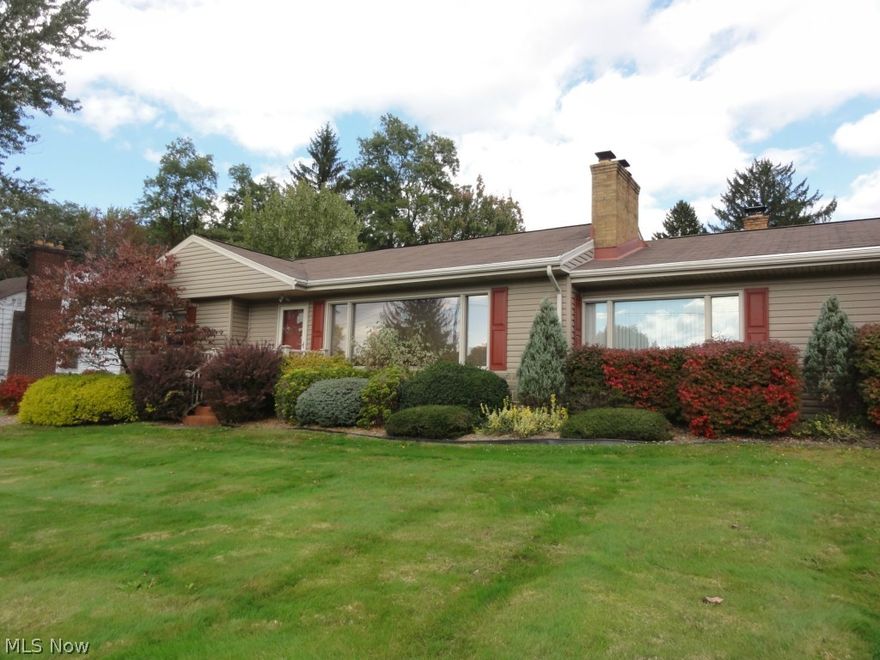 Charming Ranch, eat in kitchen with appliances, and island. 1997 replaced windows, roof, a/c, doors & siding. Deck 12x18, hardwood oak floors under carpet, 3 fireplaces, cedar closet, lower level 4th bedroom or family room. Workshop 43x15 lower level.