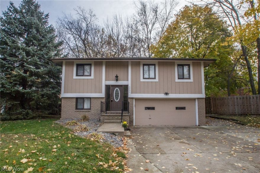 Large multi level home with 3 bedrooms and 2 full baths * Living room is open to formal dining area and patio doors to multi level enclosed deck/patio * Open kitchen with stainless appliances * Washer and Dryer stay * Lower level has family room with wood burning stove, laundry room, full bath and garage access * Furnace and C/A 2 years old * Hot water tank 3 years old * Roof 2 years old * Newer electric * Storage shed * Deck freshly stained * Attached 2+ car garage with opener * One year home warranty!  Must see this one today!