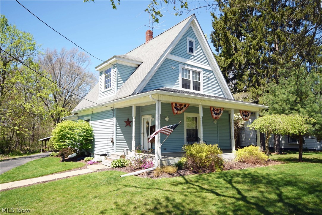 Old world charm with all the upgrades! Great curb appeal with an awesome wrap around front porch. First floor master bedroom, updated bathroom including tile flooring and granite countertop, first floor laundry, remodeled kitchen, spacious dining room. Oversized 2 car garage with an additional carport. Updates include: new septic system (2015), new water heater, sump pump, front and back roof with new 6" gutters and downspouts (2015), new electrical panel (2010), 1st floor bathroom (2015). You won't find another one like this! Call today to schedule your personal showing!