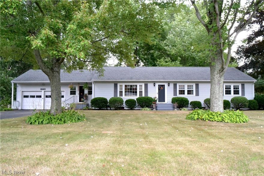 Look no further! This spacious Ranch home is exactly what you've been searching for. Situated on over an acre of land near the heart of the Portage Lakes and less than a mile from the State Park. When you pull into the driveway you will quickly note the great corner lot, 2 car garage and additional parking space. The main level of the home features a den/family room, eat-in-kitchen, huge living room with wood-burning fireplace, 3 spacious bedrooms, and recently-remodeled full and half baths. Have tons of stuff? No lack of closet space in this house, including a cedar hall closet. Newer flooring and fresh paint throughout most of the main level. The partially-finished basement offers a massive rec room with an additional fireplace, a handyman's dream workshop, and plenty more storage. Walk out of the lower level to the back and you will find even more parking space which would be perfect for an RV or boat, an additional 1 car garage - great for all your tools and toys, and LOTS of well-