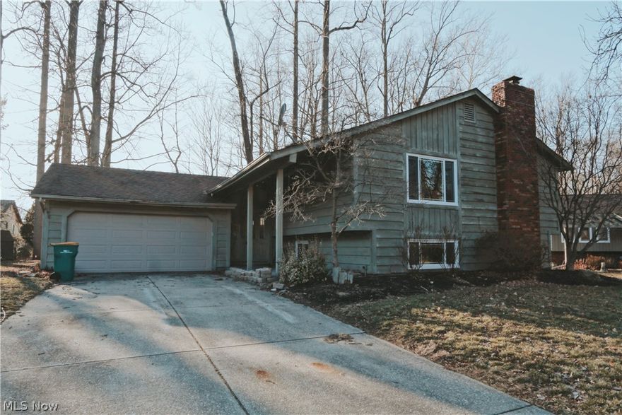 Beautiful 4 bedroom 4 bath split level home on cul-de-sac in sought after area! Large living room with vaulted ceilings.  Dining room with sliders that walk out to deck. Spacious kitchen with tons of cabinetry and stainless steel appliances! Master suite with glamour bath and jacuzzi tub. Huge lower level complete with wood burning fireplace and wet bar! Schedule your appointment today! Won't last!