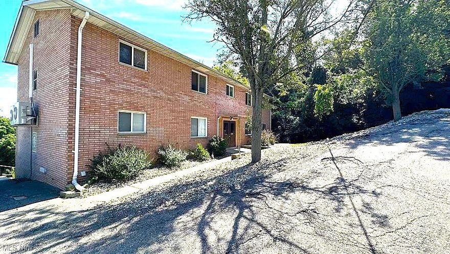 Welcome to this cozy, well-maintained 1-bedroom, 1-bathroom apartment, offering both comfort and convenience in a prime location. The open layout provides a versatile space to arrange furniture, perfect for relaxing or entertaining. Central air conditioning ensures that you remain comfortable year-round, no matter the season. The kitchen is efficiently designed to maximize space and functionality. It comes equipped with a full-size stove and refrigerator, making it easy to prepare meals at home. There are plenty of cabinets for storing kitchen essentials, and the countertops offer ample space for meal prep. The open design ensures that the kitchen is easy to navigate, whether you're cooking for yourself or hosting a small gathering. The bedroom is spacious offering plenty of room. A generous-sized closet offers ample storage space for clothing and personal items, helping to keep the living area neat and uncluttered. The full bathroom is conveniently located just off the living area and features a clean, functional design. It includes a standard bathtub and shower combination, a toilet, and a vanity with a mirror. One of the standout features of this apartment is the off-street parking space included with the unit. The apartment also offers a front porch, adds a welcoming touch. Additionally, the building offers on-site laundry facilities, so you can take care of your laundry needs without having to leave the premises. This feature makes laundry day more convenient and hassle-free. Whether you're commuting to work or enjoying nearby amenities, this apartment offers a perfect balance of convenience and comfort. Whether you're a first-time renter or someone looking for a comfortable home, this apartment is ready to offer you a peaceful and convenient living experience. No HUD. No Pets. No Smoking. Utilities are included in the total cost of rent!