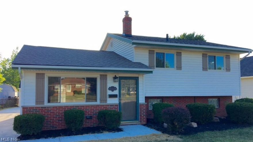 Welcome home to this completely remodeled split level home in the heart of Brook Park. The open floor plan and renovated kitchen are breathtaking. Minutes from shopping and highway. Fully remodeled bathrooms with ceramic tile and granite tops. Fully finished lower level with rec room and full bathroom are a sports lovers dream. New roof, new windows, new drive way, newer water tank, furnace and A/C unit. Spacious garage is 2.5 car space with newer door. The spacious back yard is gorgeous and ready for family fun. Amazing upgrades on this home are of the highest quality. A 1 yr home warranty is being offered on home. Make appointment today, this home won't last!!