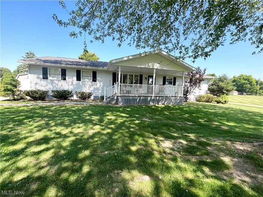 Lovely maintenance free home “move-in” ready.  Convenient floor plan w/first floor laundry and huge master suite w private bath and walk-in closet. Cozy covered back porch over looking large level one acre lot. 2 car attached garage, 1 car additional detached garage great for storage.  Full basement w high efficiency heat pump - cools in the summer, heats in the winter, all electric, low utility bills, new hot water tank, new gutter guards, sump pump w/back up battery in case electric goes off. (Battery may need replaced as seller has never used it Home is located just minutes from Salt Fork State Park and Interstate 77.