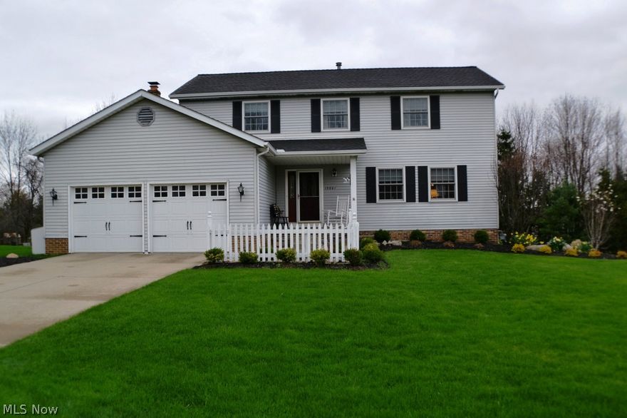 Wow!  Outstanding family home situated on a professionally landscaped 97' x 213' lot!  Features include a spacious living and dining rooms, wonderful family room with wood burning fireplace, beamed ceiling and bow window, large recently remodeled (2012) with granite counter tops, extra deep stainless under mount sink with disposal, Kenmore stainless steel gas range, microwave, dishwasher and refrigerator, loads of cabinets and pantry, four large bedrooms - master with full bath and double closets, convenient first floor laundry room with double utility tubs, finished rec room with Berber carpet, extra storage and workshop area with utility tub, spacious two car garage with floor drain, hot and cold water, service door, new twin garage doors installed in 2013, and custom storage cabinets, large custom multi-level deck with sun shield arbor, storage shed, fire pit area, and much more.  Recent updates include new roof with tear-off in 2007, new front door and sidelight 2006, Anderson repl