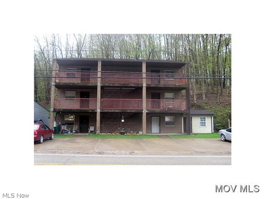 Nice 3 story brick & vinyl #6 unit apartment building. Each unit has living room,kitchen with electric appliances, dining area, 1 bedroom, 1 bath and plenty of closet space, electric baseboard heat, window air conditioner. Shared coin operated laundry facility on site for tenants only and #6 off street parking spaces. All units have covered porch area in front. Each unit rent includes, water, trash, sewer. Each unit has separate electric service and is tenant responsibility. Shown by appointment and financials will be provided  to pre-qualified buyers only.  Elem: Creed Collins Elementary Schoo  Elem/Bus: Y  JrHigh: Ritchie County Middle School  JrHigh/Bus: Y  High: Ritchie Cty. High  JHigh/Bus: Y  Fire: VOL  Police: CTY  PossFreeGas: N  ;GAR= Gar Other-See Remarks, ;PRKG= Off Street,