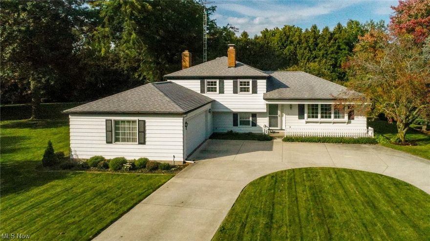 Get your creative juices flowing and make this great Huron house your home! This multi-level home is ready for a new owner.  It includes 3 bedrooms, 2 full baths, a formal living room, kitchen, formal dining room, a large family room with a wood-burning fireplace, a three-season room, and a two-car garage that is accessed by a paved, pull-through driveway. Located on a large lot in the established Fitzgerald subdivision, this home has easy access to both shopping and natural areas.