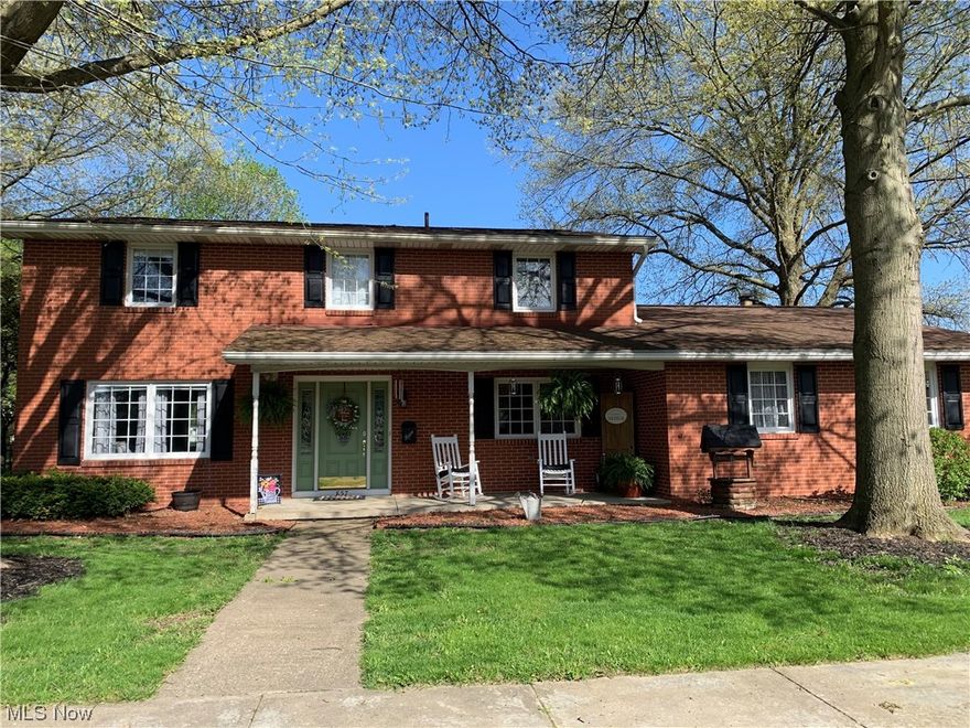 Lots of house in a great location! This 2 story brick home on a corner lot features an open concept kitchen, first floor laundry, 2.5 car garage and a beautiful brick patio with outdoor fireplace and remote control canvas awning. The backyard has a new vinyl privacy fence. It's got everything you need to entertain family and friends! Finished lower level with recreation/bar room, living room and bonus room that could be used as a bedroom. 2 of the upstairs bedrooms have newly installed individual heat and cooling units! Come see this beautiful South-side Home!