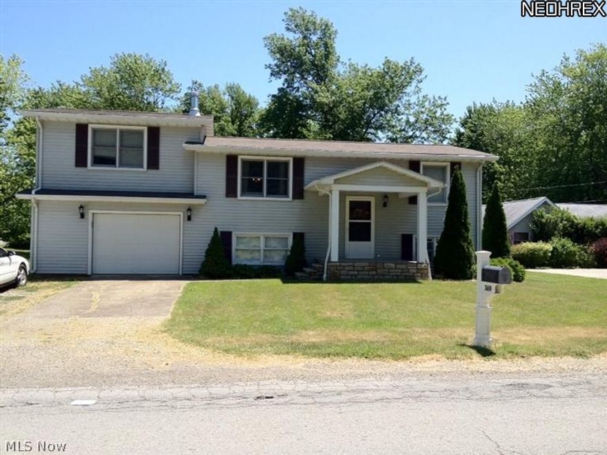 Stylish and spacious home with so much to offer! 4 bedrooms and 2 full baths will suit the growing family. You'll love the updated kitchen that includes a breakfast bar and all newer stainless steel appliances. The living room, family room and 2 bedrooms have new stain master carpet. The laundry room boasts newer king size washer and dryer. Enjoy outdoor entertaining with a covered patio and fire pit in the backyard. The garage has an additional workshop area that could be made to accommodate a 2nd vehicle, plus the out building is nicely sized and comes with a newer riding lawn mower!