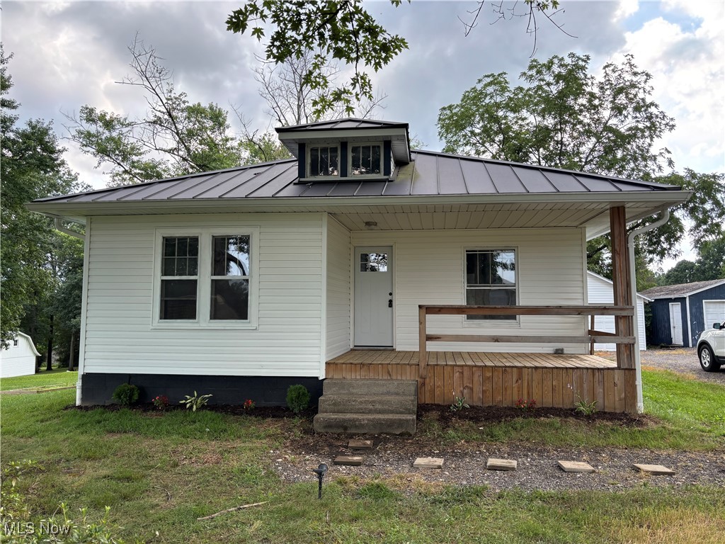 Looking for a property with room to homestead and close to town, well feast your eyes! This home sets on approximately 1.5 acres and is less than 5 minutes off I-70 for quick commutes to work and town. This home has two bedrooms possibly three depending on what you choose to do with the bonus room. Bonus room is adjacent off one bedroom and would make a great nursery or office. The kitchen has just been redone with cabinets, counters, paint, and appliances. The owner of this home will have the privilege of parking their vehicle inside if they choose in the detached garage. There is a secondary single car garage or storage building with this sale. The yard is sprawling and offers so much more potential depending on how far your imagination can travel. Make your appointment today for this highly desirable area home.