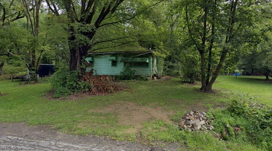 Unleash your imagination on this sprawling canvas of nature's beauty! Nestled on nearly 3 acres of prime land in the coveted Newton Falls School District, this property offers a rare opportunity to create the home you've always envisioned. Enveloped in serenity, you'll find yourself immersed in the tranquil ambiance, accompanied by a symphony of wildlife, from blackberry bushes to wild strawberries. Don't miss out on this chance to build your dream retreat amidst nature's embrace. Seize the moment and make your vision a reality today! Can be combined with the adjacent lot and home MLS# 5044457 Parcel Number 51-353000