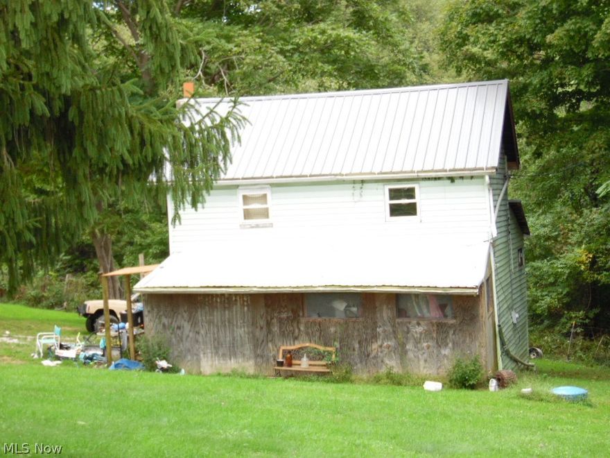 This property offers 2 homes on 2.4672 acres. One property is a stick-built home and the other property is a vinyl-sided, double-wide home. Both properties are presently rented showing a good income.