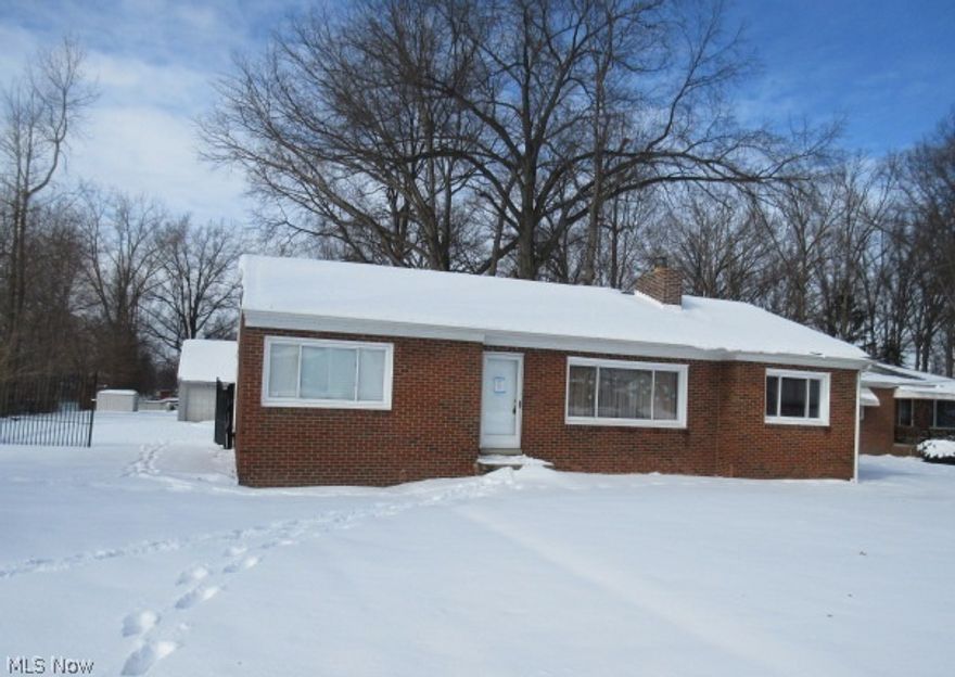 Cute 3 bedroom, 1.1 bath, Ranch home. Stone fireplace in the living room. Hardwood floors. Eat-in kitchen plus a dining room. Full, part finished basement with a roughed in 1/2 bath. Glass block windows. 1 car, possible 3 car detached garage with workshop area and a loft. Low maintenance brick exterior. Enclosed porch. Deep lot, fenced.