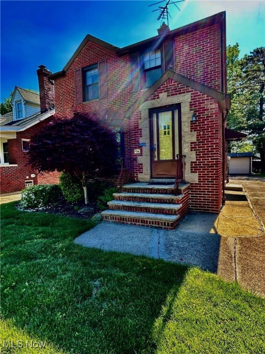 Wow!!  You'll fall in love with this all brick Tutor style home with beautiful landscaping and great curb appeal!  A perfect home for entertaining!  When you enter the front foyer you be thrilled with a large living room, decorative fireplace and a dining room.  Relax in your charming sunroom that overlooks your private backyard.  You'll be delighted with the kitchen that has ample cupboards and countertops and includes all appliances.  Other features include a finished rec room with glass block windows, an updated electrical box and a 2 car garage.  This charming home is walking distance to the lake !!!.  You won't want to miss this one !!