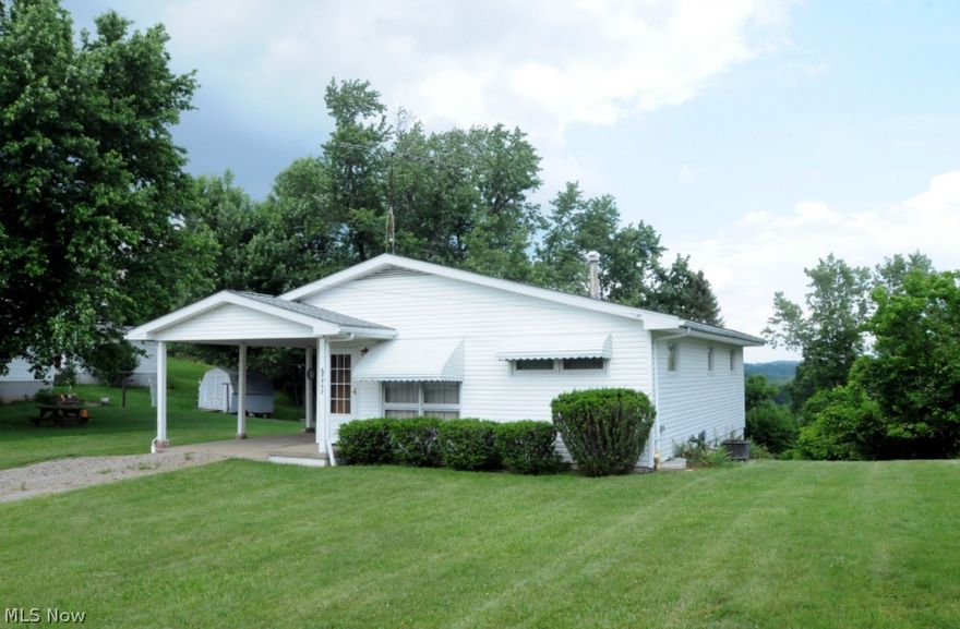 Super nice & clean. Well maintained ,offers beautiful hardwood floors throughout, eat in kitchen, updated electric (6.14.14) Storage Building.