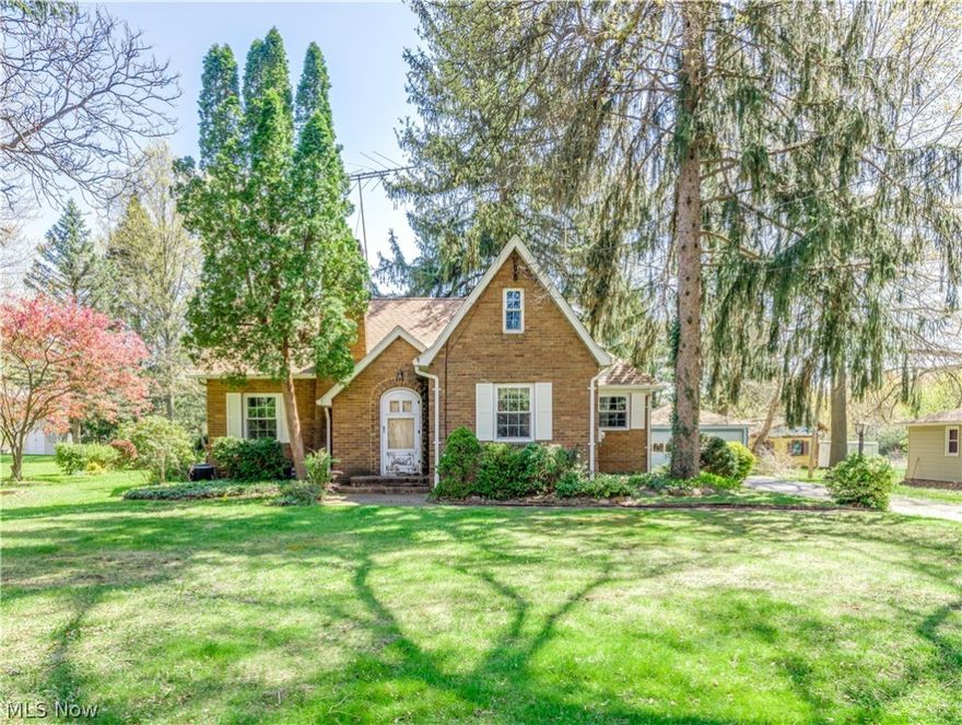 BEING SOLD AS-IS. THIS CHARMING BUNGALOW HAS 2 BEDROOMS AND 1 BATH ALL ON THE MAIN FLOOR.  THE ATTIC IS FINISHED BUT DOES NOT HAVE  HEAT/COOLING.  THERE IS A FIREPLACE IN THE LIVING ROOM.  THE SINGLE LAYER ROOF WAS NEW IN 2006 .  THE FURNACE AND CENTRAL AIR CONDITIONING WERE REPLACED IN 2014 WITH A TRANSFERABLE 10 YEAR WARRANTY.  THE VINYL WINDOWS ARE 3 YEARS OLD. ORIGINAL HARDWOOD FLOORS UNDER ALL THE CARPET. A 1 YEAR HOME WARRANTY IS BEING OFFERED. ALL THIS ON 4.89 BEAUTIFUL ACRES.