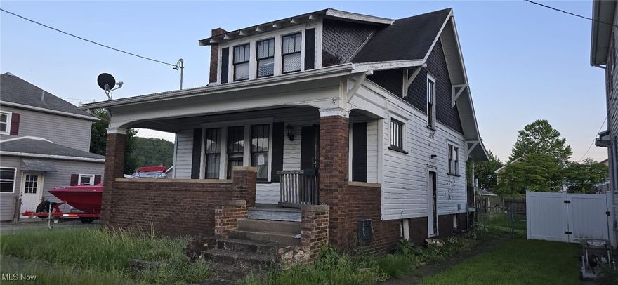 Two lots of land comes with this property! This spacious bungalow has all you need: quiet street, prime location, contemporary floor plan, plenty of space with 2 well-sized bedrooms, and bone-dry basement with laundry. Wood doors, moldings and trims are gorgeous.  The house needs a clean-up and painting but is priced accordingly.