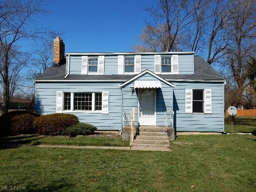 4 bedroom, spacious Cape Cod.  Home sits Back Off Road! Large detached garage. Full basement for extra storage. Hardwood floors in living room.