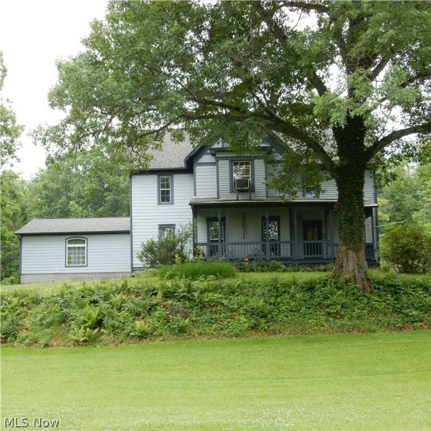 Historic Victorian. Beautifully maintained with many updates. Huge screened in back porch. The kitchen has a beautiful custom island, a nice amount of cupboards and an ample pantry. Original woodwork throughout with wainscoting in the dining room. The main floor full bath was updated in the summer of 2014 with a walk-in shower. Upstairs are 3 large bedrooms and two of them offer large walk-in closets. The updated full bath on the second floor has a Jacuzzi tub, no better place to relax after a long day. Newer windows throughout, updated electric (200amp) service, a central boiler system which heats the house and hot water will keep you warm and cozy on a cold Ohio night. Cut all the wood you need on your 19+ acres. The roof is new within 10  years and also has gutter guards. There is a direct gas line for a grill, no need to buy propane tanks. This home is being offered with a one year home warranty. Call for your private showing.
