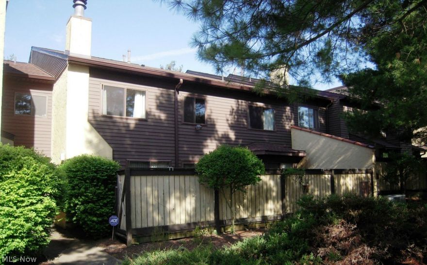 Spacious Townhouse in desirable Hampton Woods. Huge living and family room! Updated Kitchen with granite countertops & ceramic tile floor.  Newer carpeting. Private deck and patio provide plenty of space to enjoy the outdoors. New windows and sliding doors in 2010. Large owners suite featuring a walk-in closet and big garden tub. 2nd floor laundry. Storage room. 2+ car garage. Wonderful amenities with Hampton Woods Condo's including pool, tennis courts, and clubhouse. Fantastic location - Close to Naturealm, Cuyahoga Valley National Park, shopping, restaurants, Akron & Cleveland.