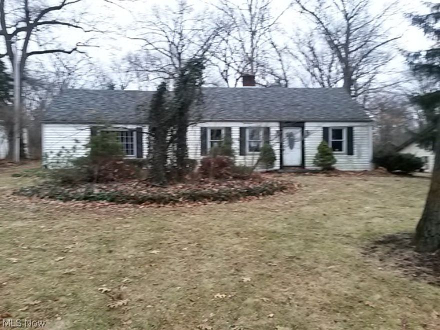 Home has great potential, needs a little TLC, but has large rooms, wood burning fireplace, large lot with all utilities.  Detached oversized two car garage.