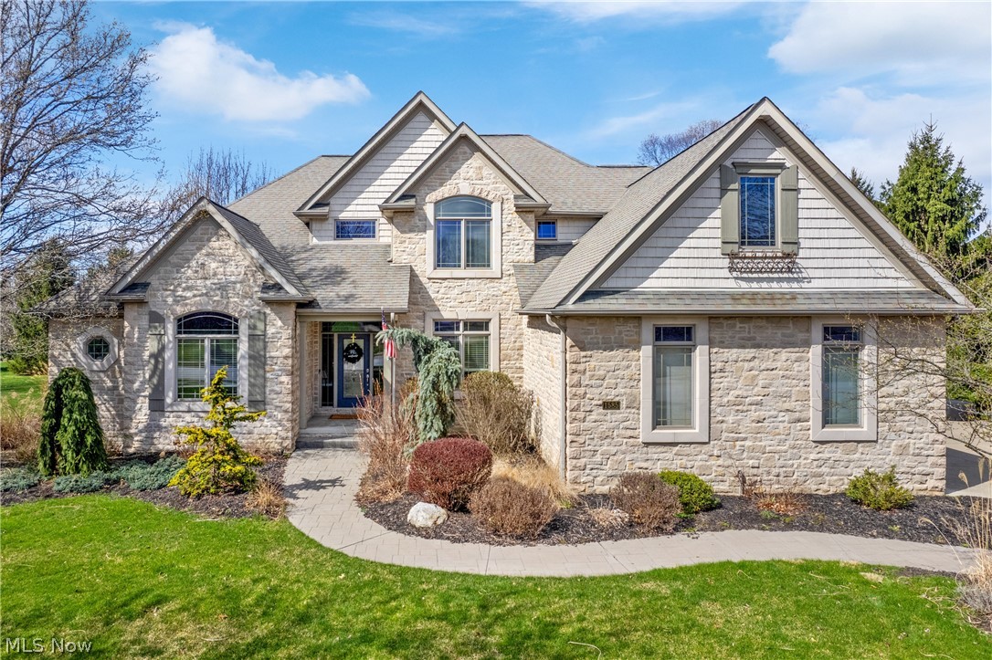 Check out this GORGEOUS colonial in desirable Monticello! From the moment you walk through the front door, you'll notice the tall ceilings, open floorplan, Brazilian hardwood floors, loads of natural light, and overall meticulous attention to detail. The welcoming foyer opens up to a formal dining room w/ tray ceiling and the two story great room with gas fireplace and windows galore! Custom eat-in kitchen with two islands, skylights, and breakfast nook/sunroom. The first floor also features a private office, laundry room, half bath, and a massive MASTER SUITE that features an attached full bathroom w/ double sinks, soaking tub, separate shower, and large walk-in closet. Upstairs you'll find a jr. suite with private bath, two more bedrooms with a jack and jill bath and a versatile bonus room! Downstairs you'll find a dream partially finished basement w/wet bar (perfect for entertaining!) and large unfinished space for workout area, workshop, and storage. Large stamped concrete patio in rear yard and plenty of space for hosting. 3+ car attached garage. Schedule your private showing today!