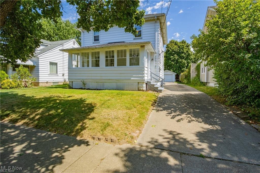 Welcome to 1145 Herberich Ave in South Akron! This beautifully renovated 3-bedroom colonial blends modern comfort with timeless charm. The first floor features a cozy living room with a fireplace, a spacious dining room with a large picture window and built-in cabinetry, and an updated kitchen. An inviting front breezeway offers the perfect spot for your morning coffee. Upstairs, you’ll find three comfortable bedrooms and a stylishly updated bathroom with subway tile, shiplap accents, and a modern vanity. Updated luxury vinyl plank flooring runs throughout the home. Whether you're searching for a move-in ready residence or a great rental opportunity, this property has it all!