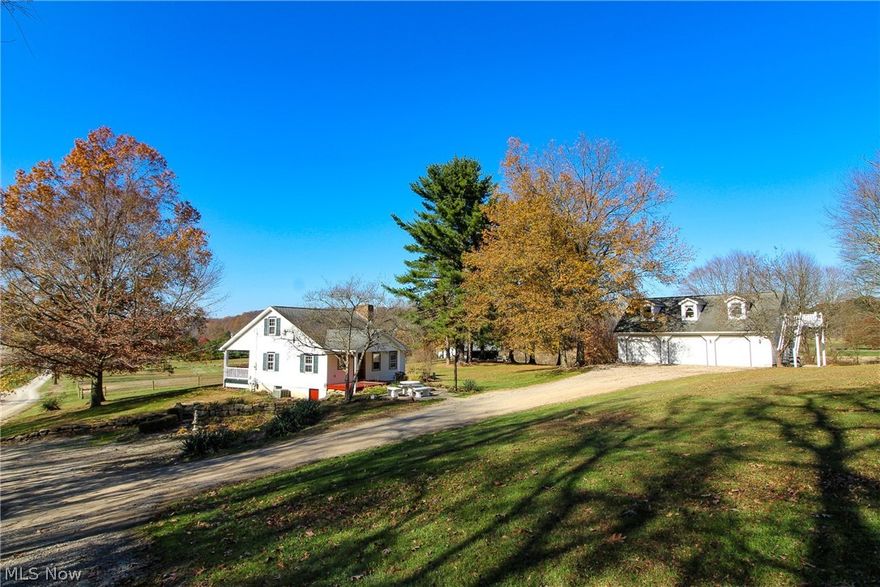 42 +/- acres. 3+/- acres of fenced pasture. 36+/- acres wooded. 2 bedroom cottage built in 1901. Remodeled in 2020. 3 car detached 2 story garage with 1 bed and 1 bath apartment on second floor.  2 stall horse barn with storage. Private setting. Taxes TBD because of new split. Tri-Valley LSD.