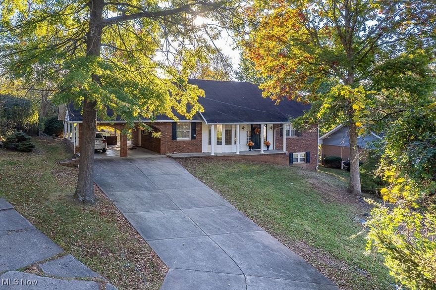 MOTIVATED SELLER!! Welcome home to this charming brick beauty tucked away in one of Southside Parkersburg’s most desirable neighborhoods. Sitting up off the street, this home offers a peaceful, private setting surrounded by mature trees and classic curb appeal.

Inside, you’ll find a bright, inviting layout featuring new flooring, updated lighting, and completely renovated kitchen and baths. The kitchen is stunning with slow-close cabinetry, stainless steel appliances, a farmhouse sink, and beautiful countertops. Enjoy meals together in the formal dining room or keep things casual in the cozy eat-in nook.

The living areas are warm and welcoming with a stone fireplace, great natural light, and easy flow to the spacious back patio, perfect for coffee, relaxing, or entertaining. The floor plan offers convenient first-floor living with a main-level bedroom and utility room, while the large rooms throughout provide plenty of space for everyone.

Downstairs, you’ll find an unfinished basement with endless potential create your own space, add a workshop, or simply enjoy all the extra storage it provides. The attached carport offers direct entry into the kitchen, making daily life simple and convenient.

Beautifully maintained and thoughtfully updated, this home blends modern comfort with timeless charm, all in a peaceful Southside location close to schools, parks, and shopping.
