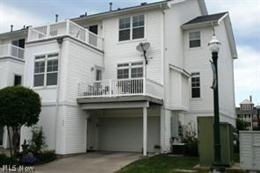 This great multi-level condo is a lovely END unit with  stunning water views to enjoy from the two balcony decks.  Main living offers open floor plan with living room with newer carpeting, kitchen, dining area and in-suite laundry.  Master bedroom has a Jacuzzi tub and two walk-in closets.  Total 2 ½ baths.  Extra room off the attached garage that can be used on storage or office. Leased boat slips available for boaters from Spitzer Marina.  Note, this unit has 1,645 square feet.  Appliances included.