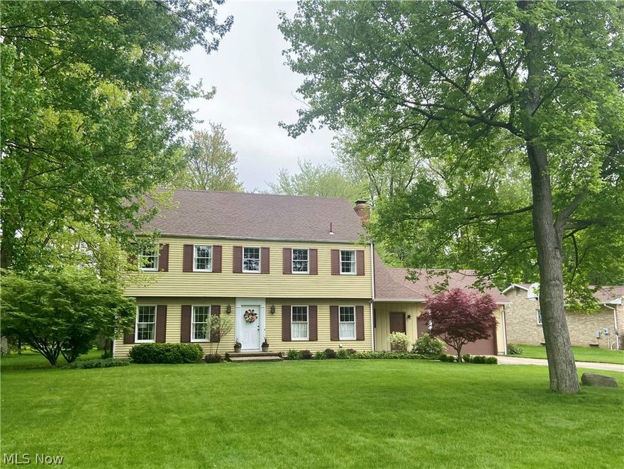 This is the home you've been waiting for! Located on an oversized lot in one of Niles' most admired neighborhoods, this classic 4 bedroom, 2.5 bath Colonial is perfect in every way. As you enter the front door, the elegant two-story foyer beckons you to explore the formal living and dining rooms. The spacious kitchen is just right for your casual dinners and offers all appliances. Moving into the cozy family room, you'll find a beamed ceiling, woodburning fireplace, built-in shelving and a slider to the backyard. Completing the first floor is a half-bath and laundry room. Follow the beautiful staircase to the second floor and you'll discover the sweetest master bedroom with a gas fireplace, comfortable window seat, attached full bath and his & hers closets. Three additional bedrooms and another full bath complete this level. Grab a drink and head out to the brick patio and generously sized backyard. It's the perfect place to host your al fresco dinner parties! Other highlights include: