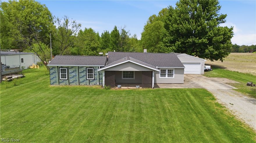 Opportunity awaits in this RANCH home located in the desirable Firelands CSD! Situated on a full acre, this property offers great potential for the right buyer ready to bring their vision to life. This home does require multiple projects and is priced accordingly—making it an excellent investment or renovation opportunity.

Inside, you’ll find an eat-in kitchen with a dedicated dining area and convenient first-floor laundry. The spacious living room features a hearth and an inviting living space. The primary bedroom includes a large closet and double doors that lead to the backyard. There are two additional bedrooms offering flexibility for family, guests, as well as space for a home office that had drywall completed. There is a primary bath, but was removed during the addition/renovation. Updates include HWT (2024), connected to city water (2018) and new windows in office and primary bedroom but still needs the trim completed.

Step outside to enjoy the backyard that includes an above-ground pool with new liner—perfect for summer relaxation and entertaining. There is a shed and a non-potable well that is still active for watering the lawn and garden and is accessible in the garage. The oversized 2 car garage also has a storage room/workshop.

Being sold AS IS, this property is ideal for buyers looking to customize and create their perfect home. Don’t miss your chance to unlock the potential of this great location!