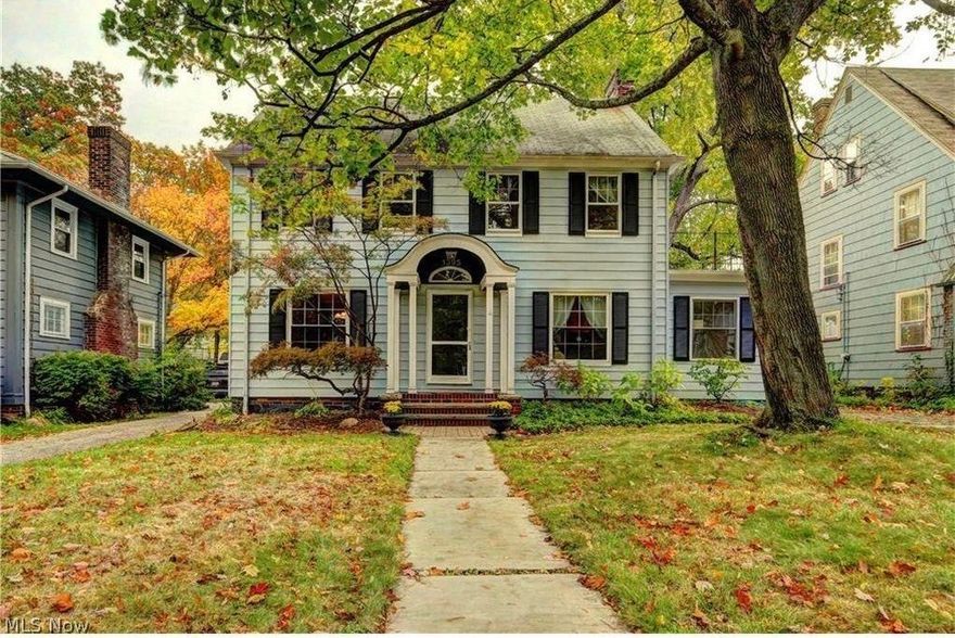 Welcome home!! This fabulous Cleveland Hts. colonial has many updates but maintains original character. Home has many newer windows, beautiful hardwood throughout. Updated kitchen features granite countertops with 2015 stainless steel appliances and Kraftmaid cabinets. Living room has a wood burning fireplace, formal dining room with tiered ceiling and crown molding and built-ins. Bonus room off living room with new windows 2015, makes a perfect office or sitting room. Second floor features 4 bedrooms with wood floors throughout. Large master bedroom with porch. Bathroom is totally remodeled with marble. Third floor has a spacious bonus room that is carpeted with a remolded full bath, also has a huge cedar closet. Basement was waterproofed with B-dry and sump pump and glass block windows. 2 car garage is only a year old with newer electrical. Home has been freshly painted throughout. Backyard is fully fenced. Don't miss this opportunity to make this turn key house your new home!