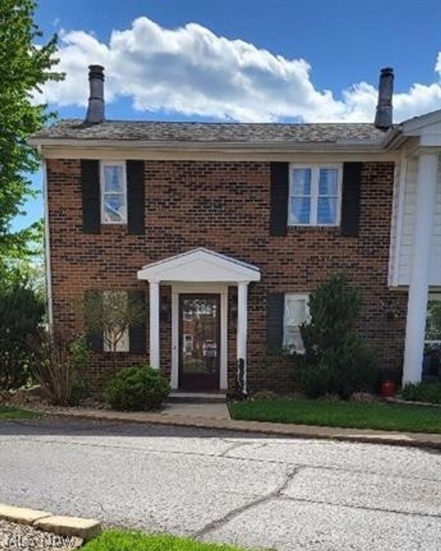 Lovely 2 story, 2 bedroom, two bath condo in Devola. Enclosed patio off kitchen with direct access to carport. End unit. Living room features electric fireplace, crown molding, neutral paint. Kitchen has been updated with extra storage & includes stove, refrigerator, dishwasher, and microwave. Laundry hookup in basement, washer &dryer stay. 2nd floor includes large closets, sitting room with electric fireplace. This unit has had gas line installed for heating. 
Some rooms need paint.
Selling as is.