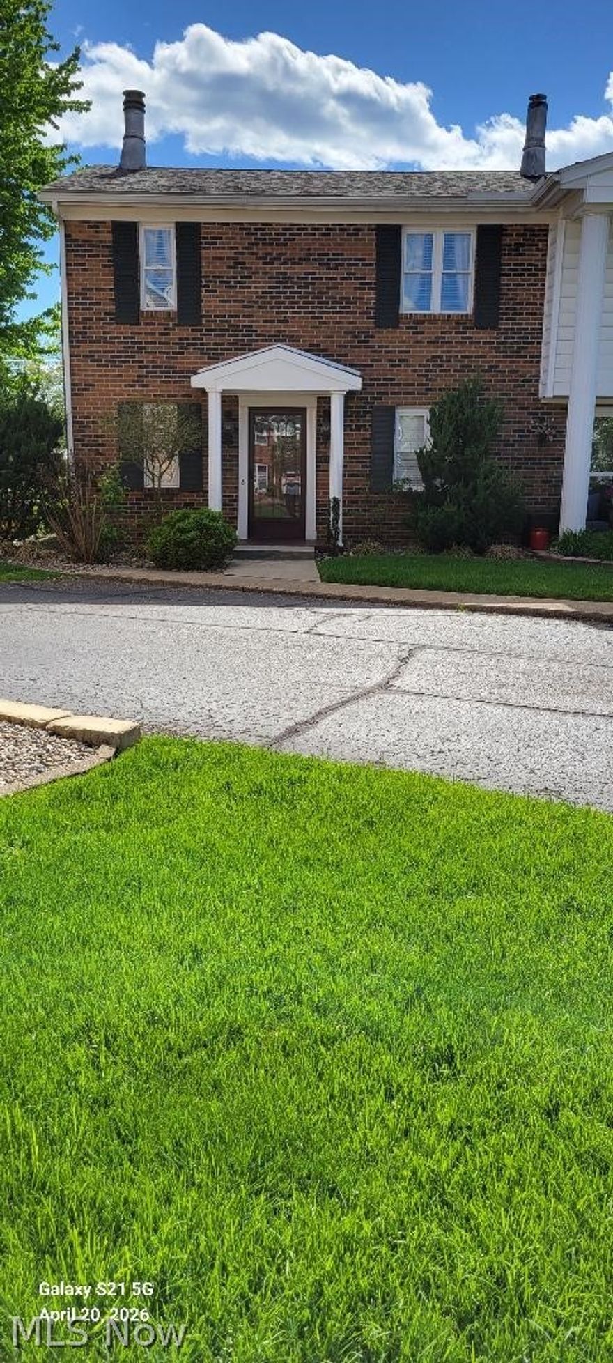 Lovely 2 story, 2 bedroom, two bath condo in Devola. Enclosed patio off kitchen with direct access to carport. End unit. Living room features electric fireplace, crown molding, neutral paint. Kitchen has been updated with extra storage & includes stove, refrigerator, dishwasher, and microwave. Laundry hookup in basement, washer &dryer stay. 2nd floor includes large closets, sitting room with electric fireplace. This unit has had gas line installed for heating. 
Some rooms need paint.
Selling as is.