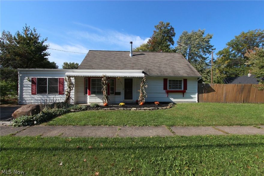 Beautifully updated and open feel cape cod in a wonderful neighborhood. The home features an open style kitchen with multiple bars, lots of space for entertainment, a wood burning stove so you never have to turn on the gas to heat the house in the winter, central air, forced gas heat option. Driveways and Car-port can comfortably fit 6 Cars and a boat. Sustainable home with many cost and energy saving features. Blown-in insulation and a wood burning heat source. The exhaust for the wood burning heat source has been upgraded to stainless steal so it never has to be replaced. Newer appliances included, with a remodeled kitchen . The home has three/four bedrooms and 1 1/2 bathrooms. Two bedrooms and 1/2 bath upstairs, master bedroom (could be used as two rooms) and a full bath downstairs. Professionally landscaped with fruit bearing trees. Home has a fenced in backyard and a cement patio with an outside brick fireplace. The house is close to schools and parks as well as the lake. Excellen