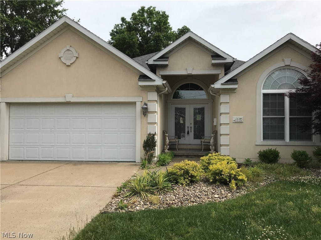 Custom 2br 2 bath ranch home with 10 foot ceilings. Large living room with two sided fireplace that opens up into a sun room. The Master bedroom is a nice size and has a large ensuite with walk in closet. The Beautiful kitchen has stainless steel appliances, tile flooring and pantry. The home is in a convenient Vienna location. The Laundry room has plenty of cabinets and storage just off of the kitchen. The back yard is flat and has a vinyl privacy fence. Two car garage with attic access. Nice home for someone wanting one level living. This home will not last long, call before it is gone.