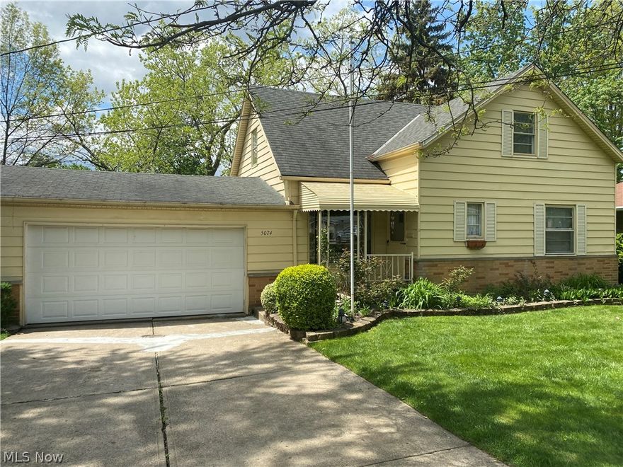 Welcome to this charming Garfield Hts Bungalow. This owner has lovingly cared for this home since 1974, and will be a great home for years to come. The large living room offers a cozy place to relax and look out the front window as it fills the room with natural light. Through the living room to the dinette and kitchen with ample space and access to the LARGE deck and EXPANSIVE views overlooking the Cuyahoga Valley. The view ALONE is enough to make anyone want this home! You'll also find 2 bedrooms and a full bath on the main level. Upstairs to an enormous bedroom with gorgeous pine flooring and lots of storage space. 
WAIT !! we're NOT done yet, head down to the WALK-OUT partially finished basement with another full bath and GREAT Man/Woman "CAVE" or recreation/living area. Don't miss this GEM !