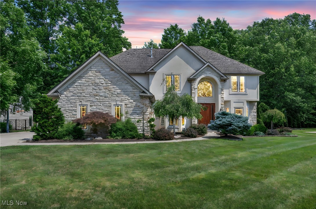 Discover luxury living in Westlake’s Rosewood Estates at 25659 Carnation Run. This custom 2007 Colonial offers 5,294-sq ft of upgraded elegance: 4 beds, 3.5 baths, chef’s kitchen with granite counters, spacious formal rooms, and finished walk-out basement with rec room and full kitchenette. Natural light fills every room through bay windows and tall entryways. A private stamped-concrete patio overlooks lush landscaping, complete with outdoor lighting—perfect for entertaining any season. Inside, enjoy the warmth of a gas fireplace, open layout that flows through the entire first floor, and an oversized 3-car attached garage with high-end doors. Located on a peaceful cul-de-sac in Westlake’s top-rated district, this home is turnkey. Fall in love with elevated living in one of Westlake’s most coveted neighborhoods.