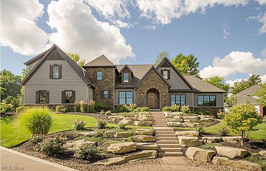 Entertain with elegant ease in this spectacular Concord home, on the golf course of Little Mountain Country Club.  This home has a lower level full service executive chef kitchen designed to invisibly provide service to the entertainment area and private access to the upper level offering full service to the pool house and outdoor entertaining areas.  This estate welcomes you and your guests with refined grandeur, emphasizing nature indoors and outside. Its modern design incorporates natural woods, stone, metals, glass, architectural angles and lush landscaping. Effortlessly entertain a few friends or a large group in the open-plan interior and on the back patios looking out to the golf course. Recharge your spirit in the first-floor master suite. Invite guests to stay awhile in the first-floor guest suite and three second-floor bedrooms. Enjoy poolside fun, barbecuing, splashing in the pool and unwinding in the hot tub. Relax in the sitting rooms, poolside or in the pool house’s living room. Have hours of fun on the lower level, including a game room, full bar and athletic gym. Select a favorite vintage from the wine cellar. Pamper yourself in the in-home spa, ready for your favorite massage therapist, esthetician and nail artist.Attend to your business’ details in your home office. Enjoy the vibe of Concord, at art and food festivals, music concerts and special events. Experience the best of laid-back home time and gracious social entertaining in your Concord home.