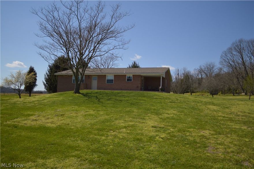 Beautiful remodeled home, move-in ready! This home offers new oak kitchen with pull out trays, self closing doors and drawers, bar, oversized pantry, and lots of cabinet space.  Living room/dining room combo with hardwood floors exits to back or front deck, bedrooms all offer new laminate floors and custom closet railing, two new remodeled baths.  New windows, new air conditioning unit and duct work, full walkout basement could be finished.  Sits on 8 flat acres, 2 car garage with shed.  An absolute must see!  Owners relocating.  #845  Marietta Schools with bus pickup.  Fire Department Volunteer, Police Sheriff.