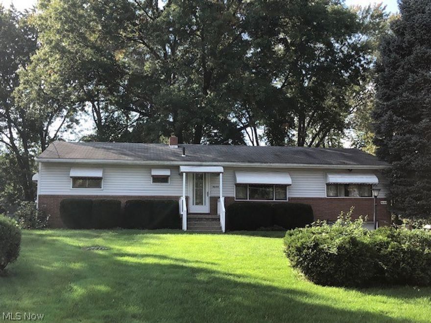 Welcome to 4644 Garrett Dr, Norton.  3 bedroom spacious ranch home w/2 full baths and family room.  Needs a bit of love but offers wood floors under the carpet and has a family room with a fireplace. Beautiful lot and covered patio.  Priced under market value to accommodate for improvements. Updated electric panel.  Checkout 4644 Garrett Dr, Norton today.